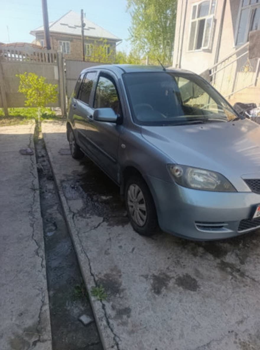 Mazda Demio II (DY), 2004