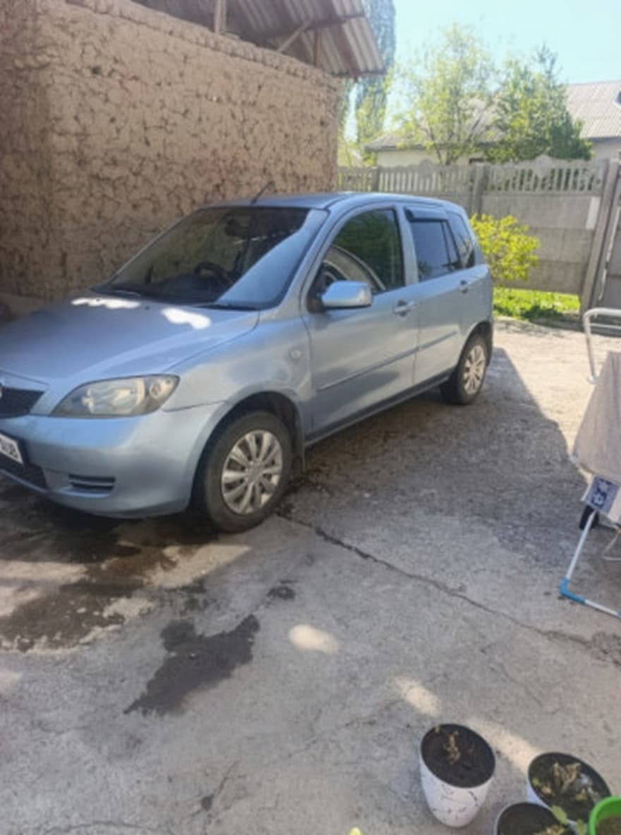 Mazda Demio II (DY), 2004